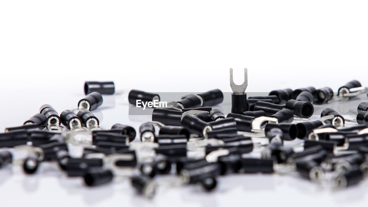 CLOSE-UP OF PIPES ON TABLE