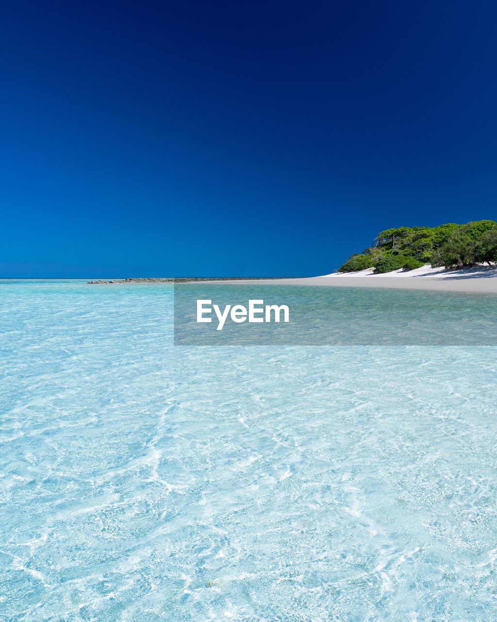 View of sea against blue sky