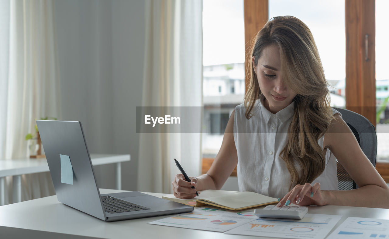 businesswoman working on table