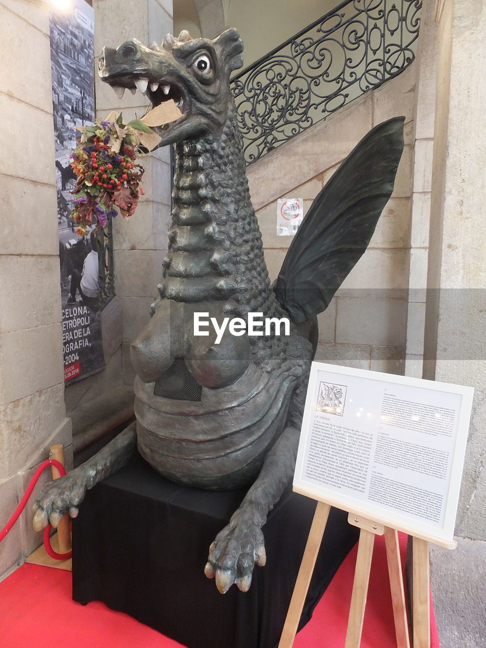 LOW ANGLE VIEW OF MONUMENT ON FLOWER