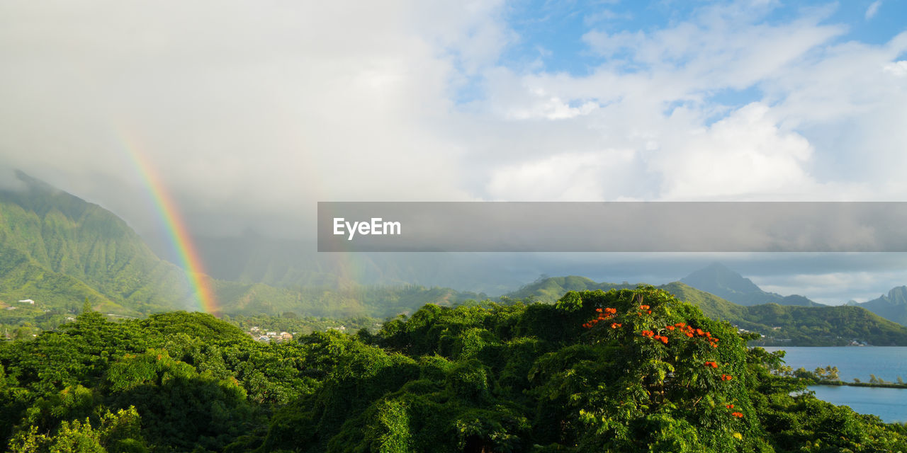 Scenic view of rainbow against sky