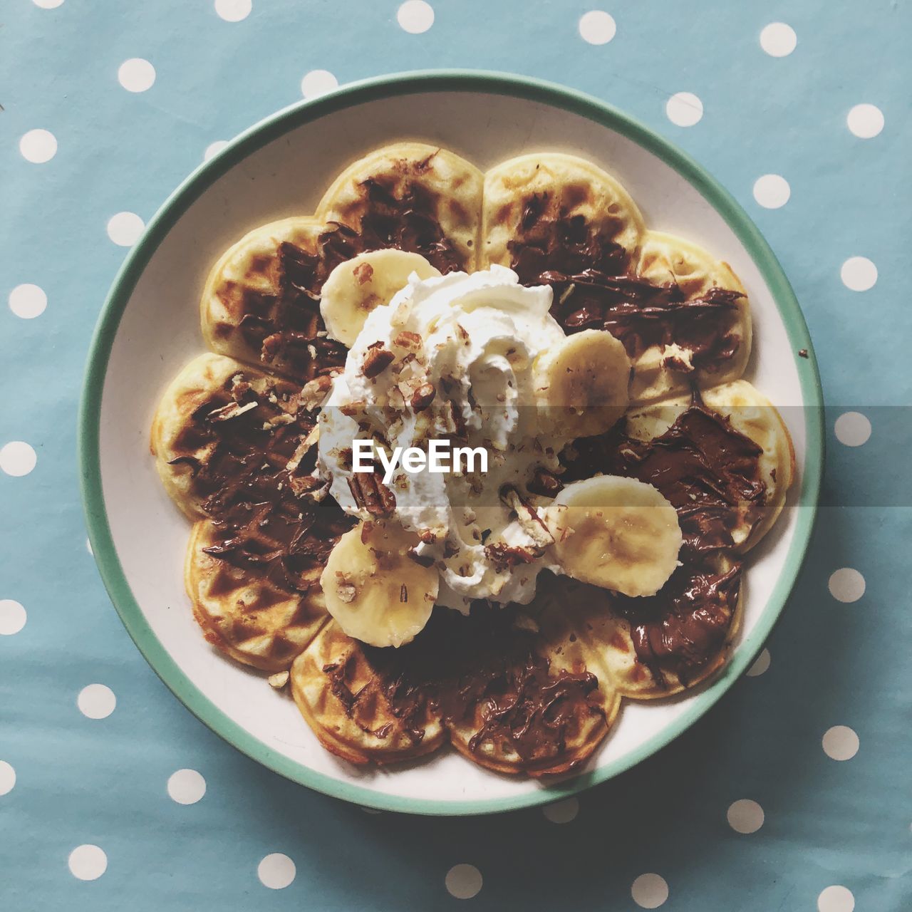 Directly above shot of pancakes served in plate on table
