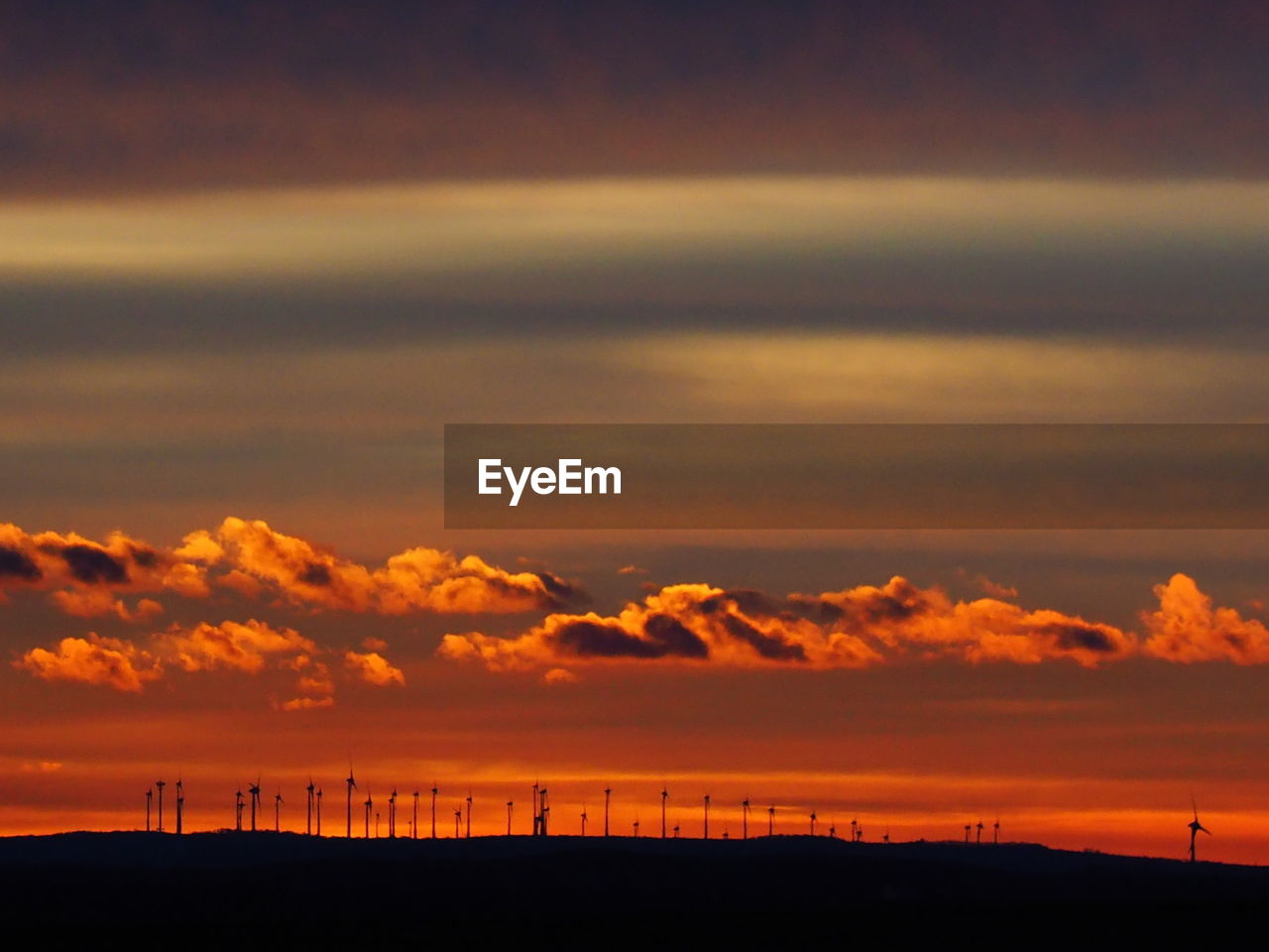 Scenic view of silhouette landscape against sky during sunrice