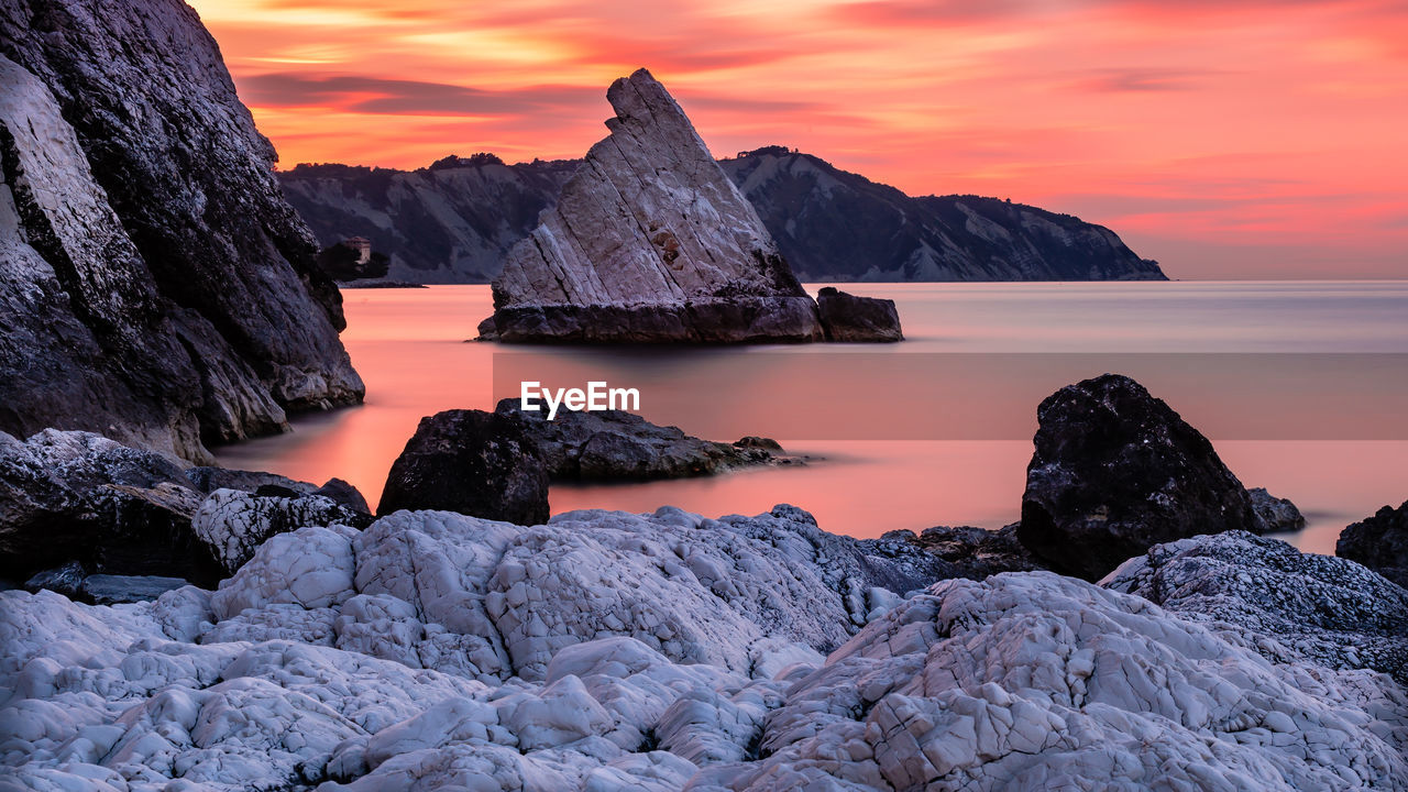 Scenic view of sea against sky during sunset
