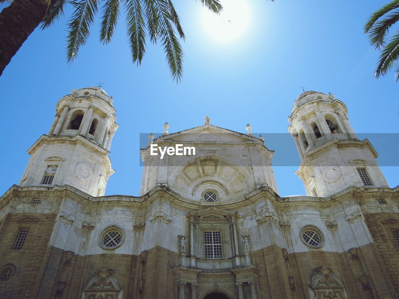 Low angle view of building against blue sky