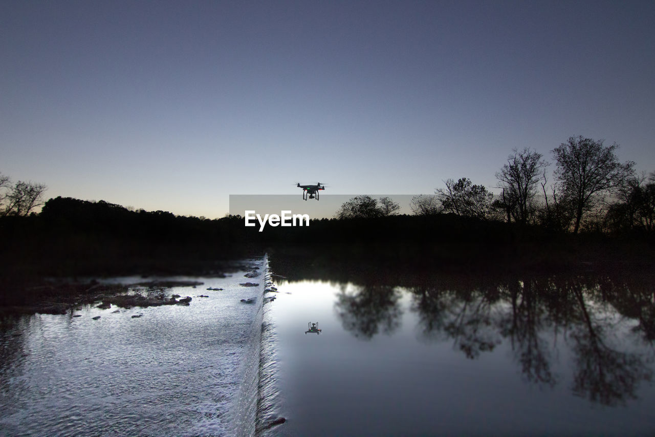 Scenic view of lake against clear sky