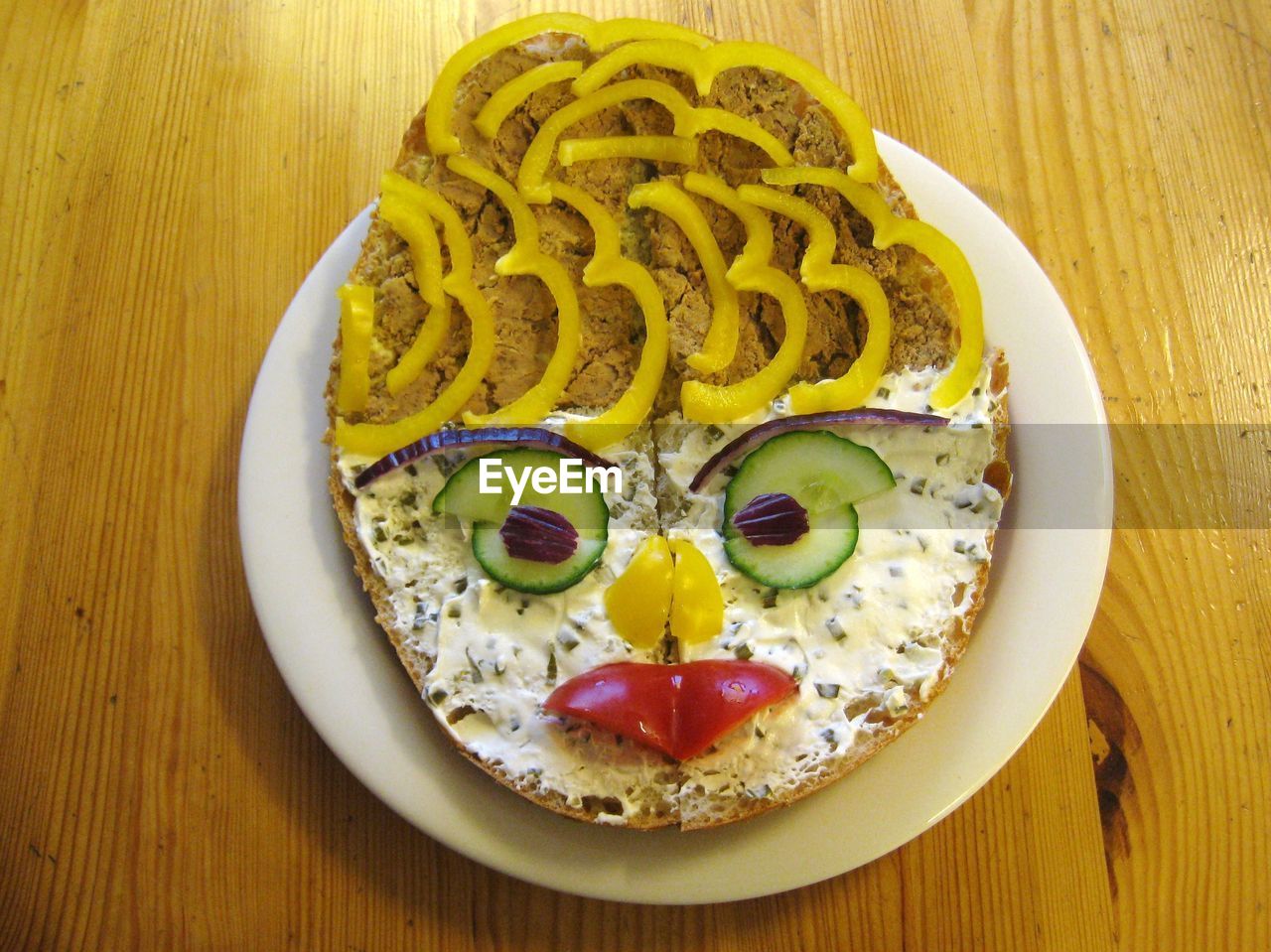 High angle view of face made on sandwich