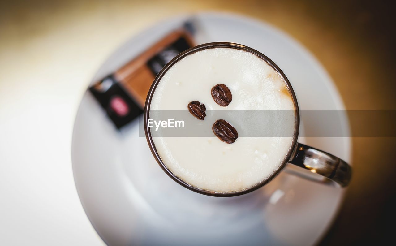 CLOSE-UP OF COFFEE ON TABLE