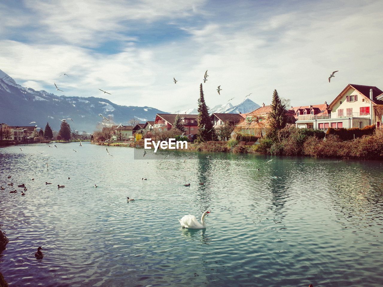 View of town against cloudy sky