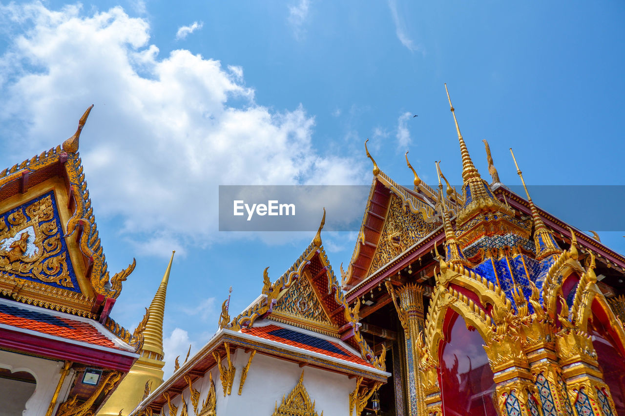 LOW ANGLE VIEW OF TEMPLE AGAINST BUILDING