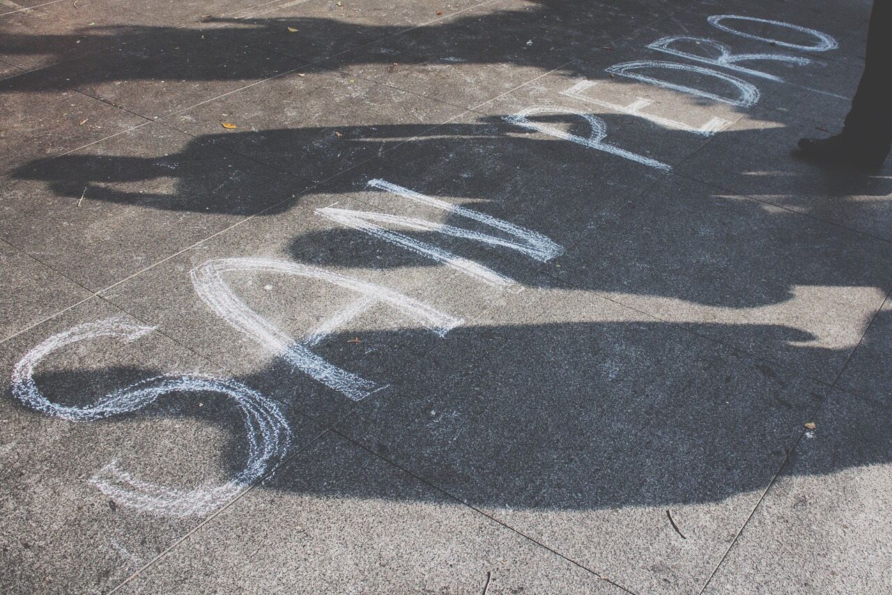 HIGH ANGLE VIEW OF SHADOW OF ROAD