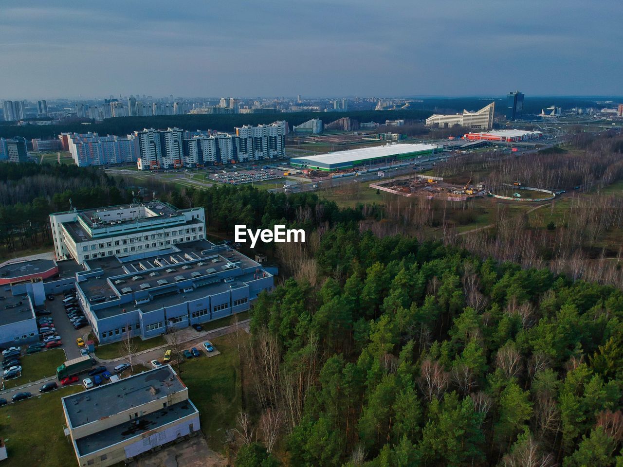 High angle view of buildings in city against sky