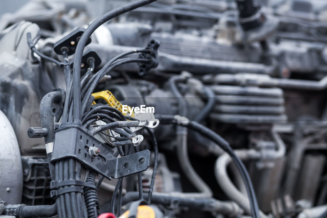 Close-up of a bunch of black wires - a wiring of a truck