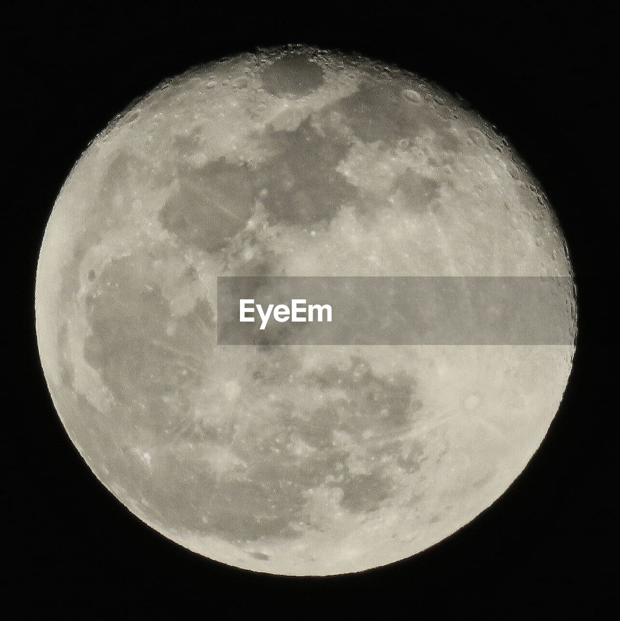 LOW ANGLE VIEW OF MOON OVER DARK SKY