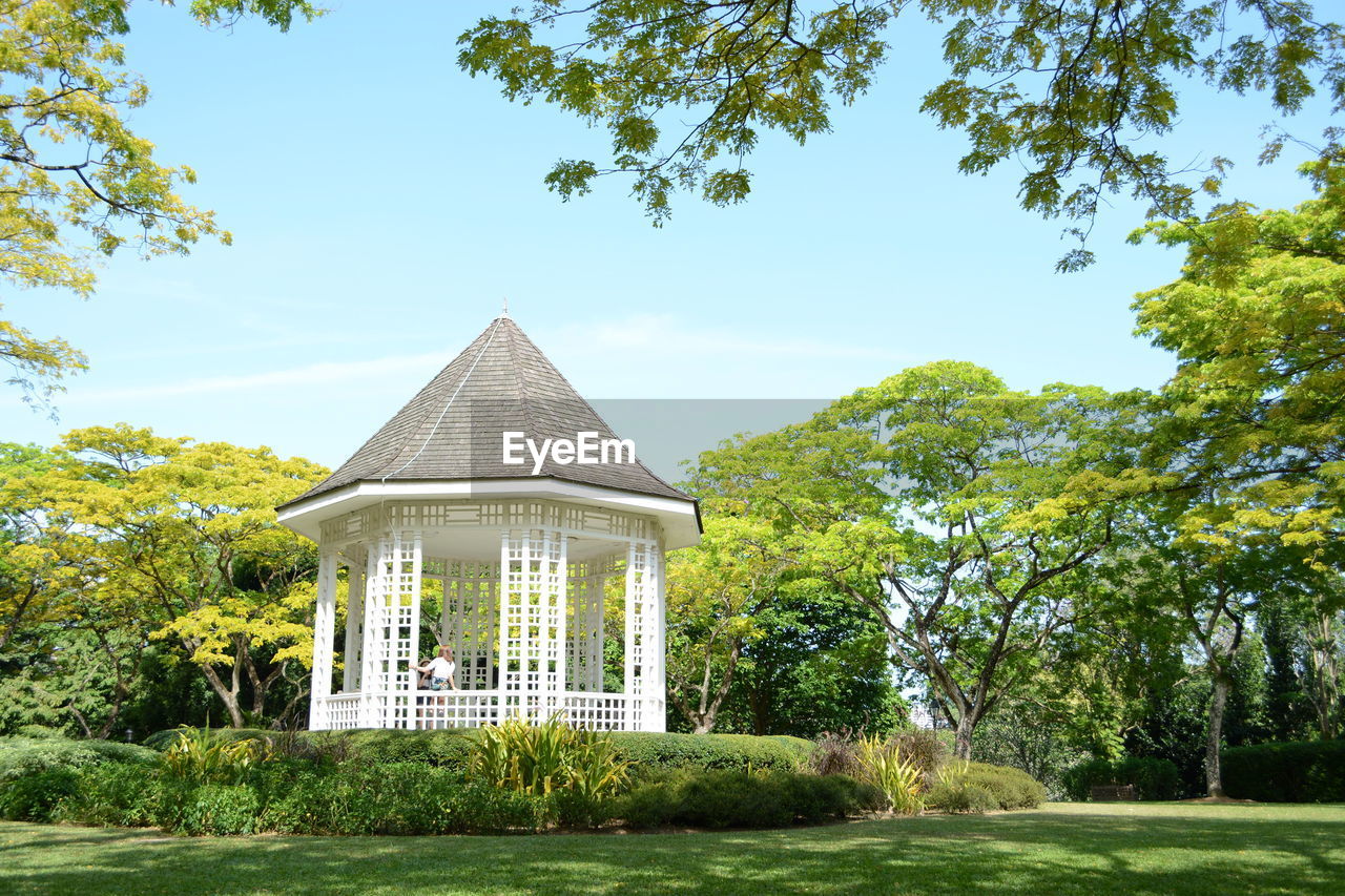 Built structure against trees