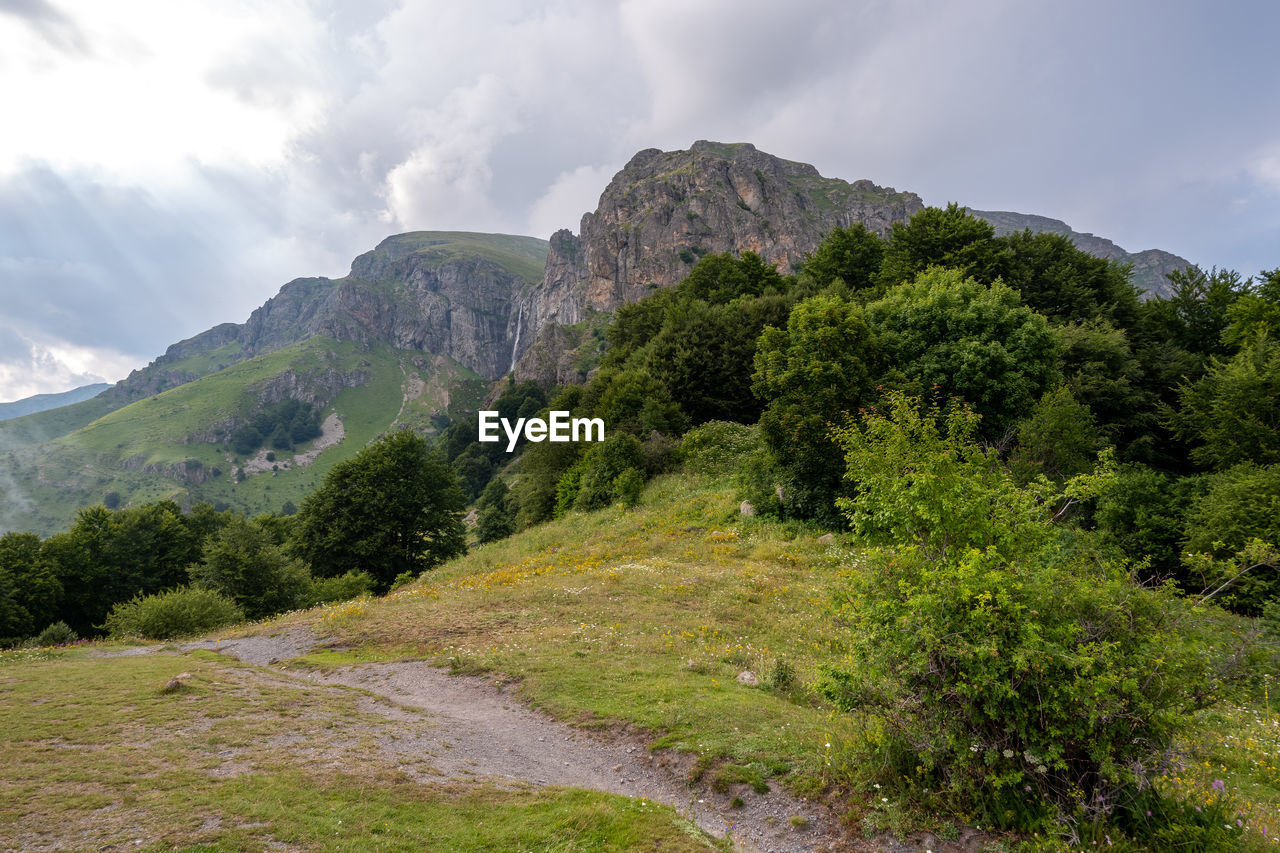 SCENIC VIEW OF MOUNTAIN AGAINST SKY