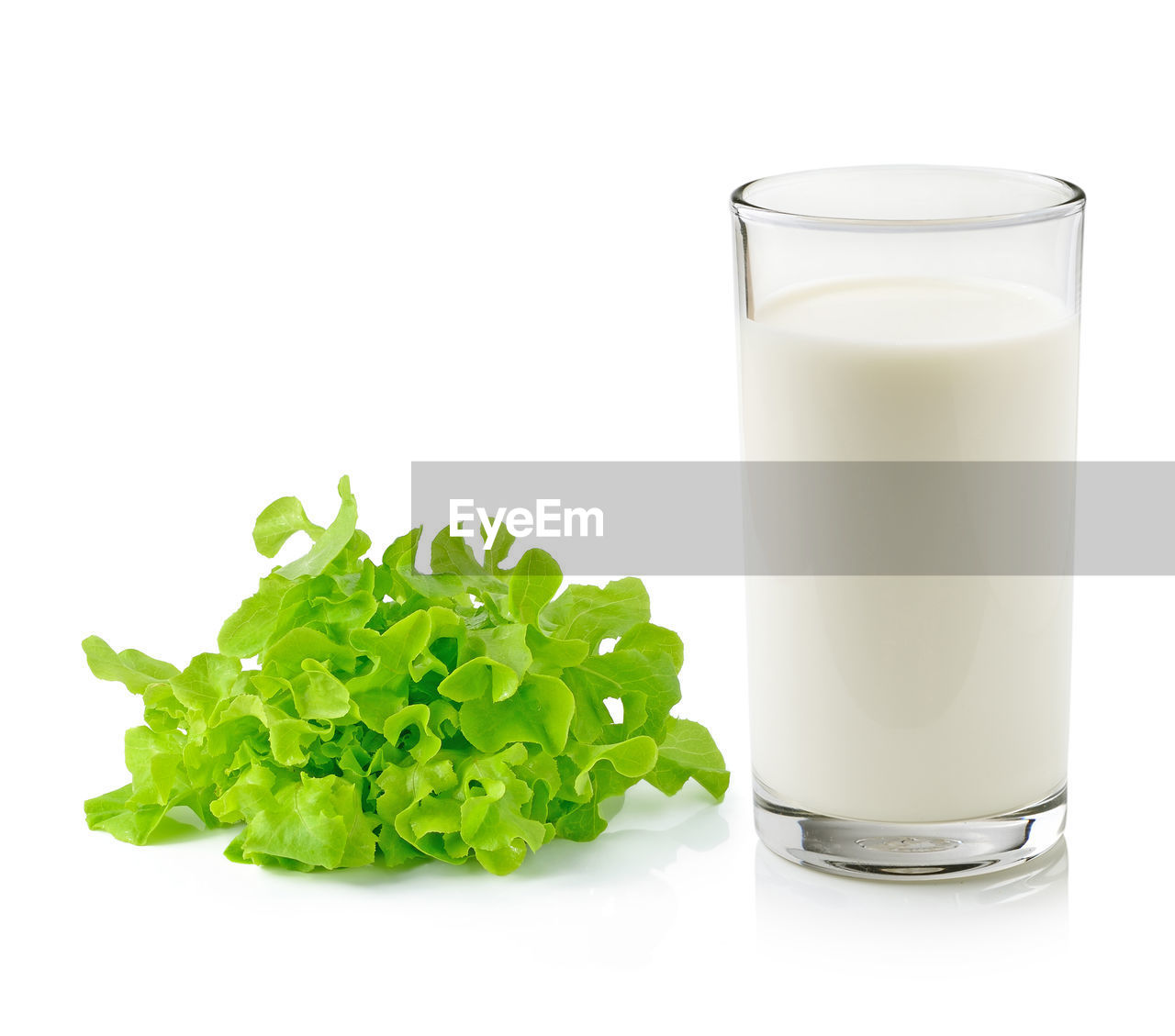 CLOSE-UP OF DRINK WITH GLASS OF WHITE BACKGROUND