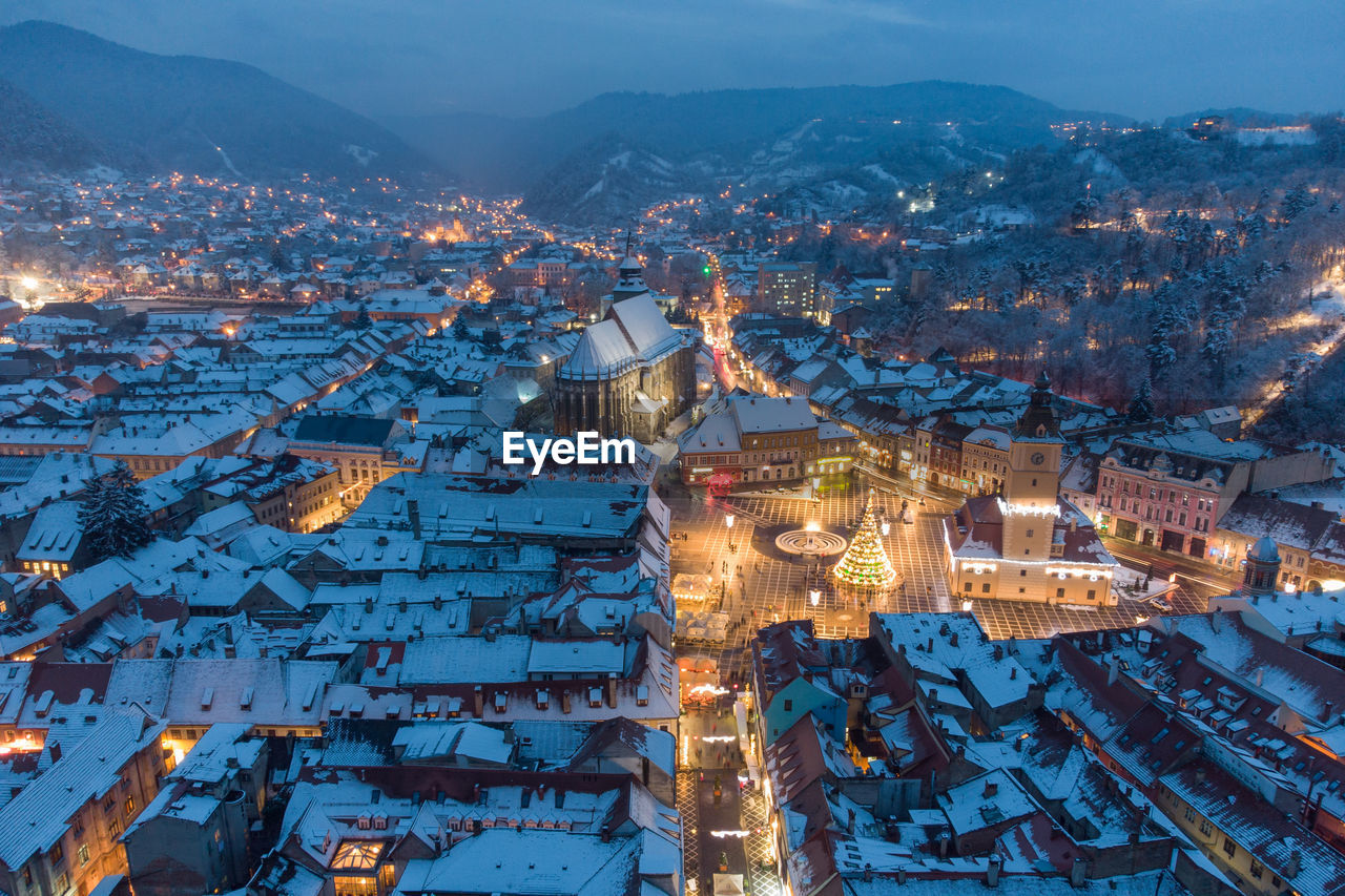 High angle view of illuminated city during winter