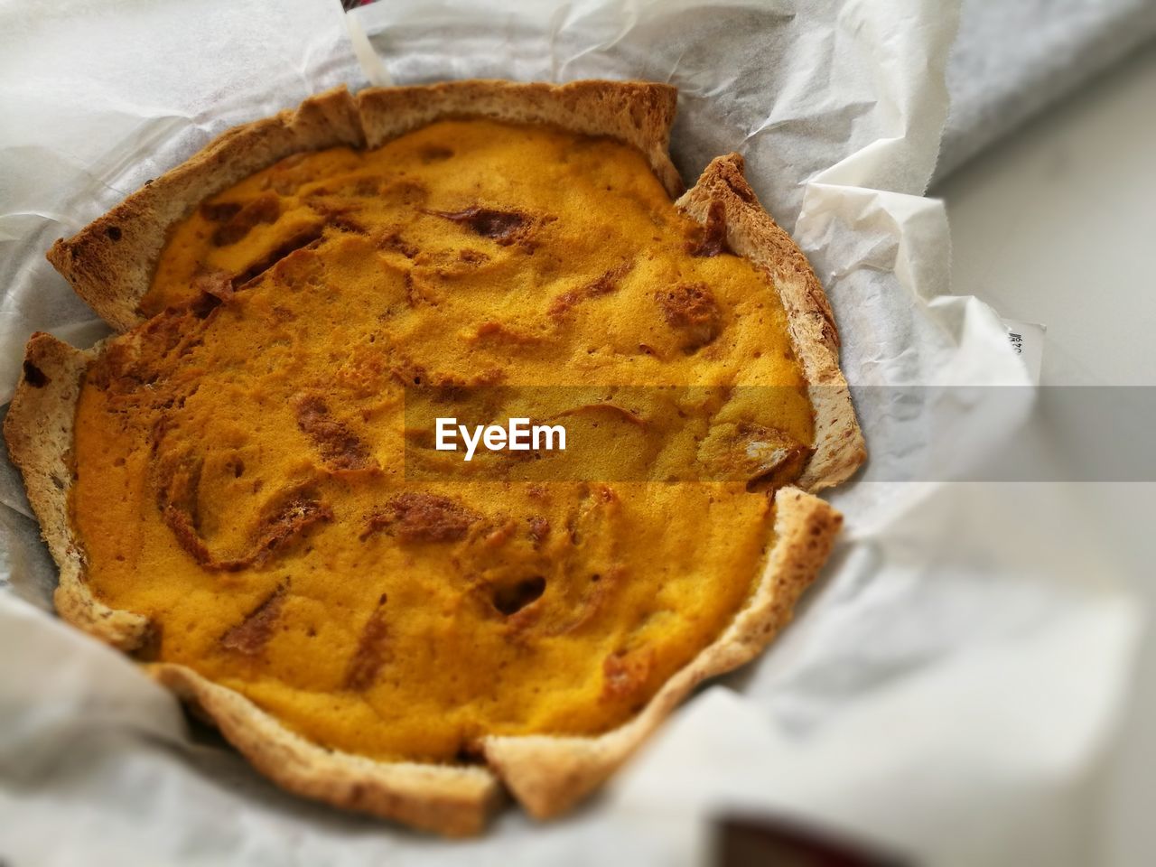 High angle view of pumpkin pie on table