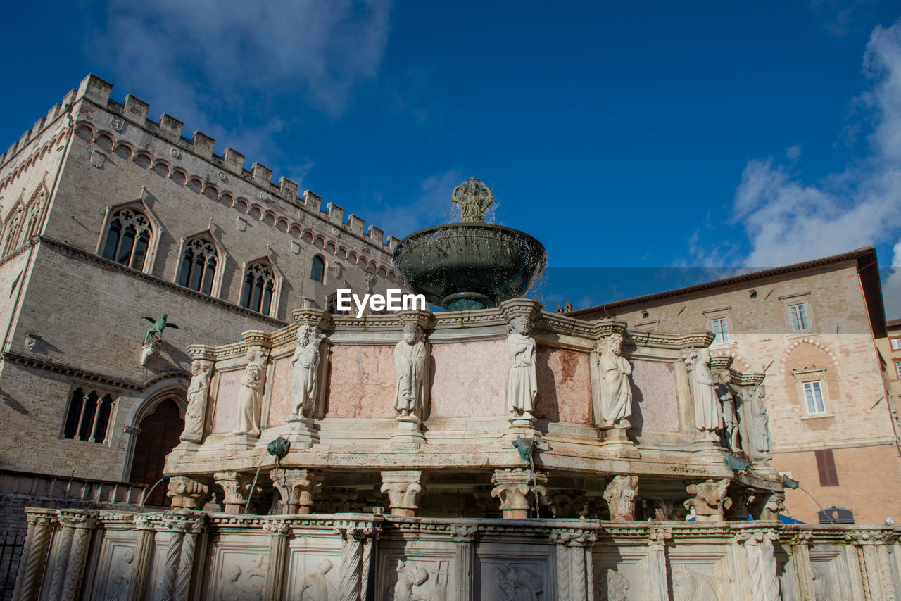 architecture, built structure, building exterior, sky, travel destinations, landmark, history, the past, travel, religion, building, facade, cloud, nature, ancient history, tourism, city, place of worship, low angle view, blue, belief, no people, worship, spirituality, outdoors, day, ancient, sculpture, old, town, palace