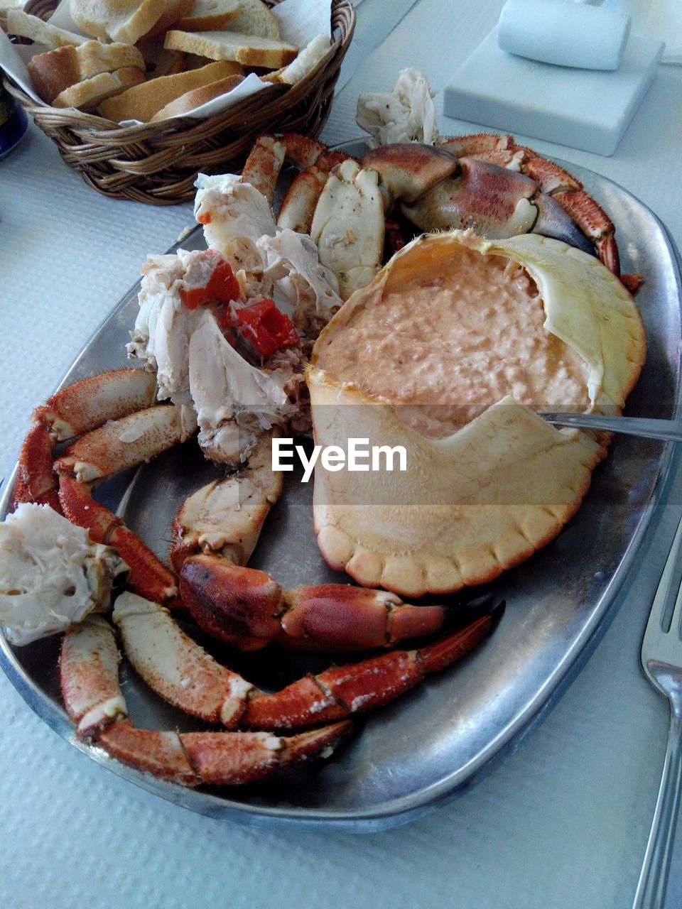 CLOSE-UP OF MEAT ON TABLE