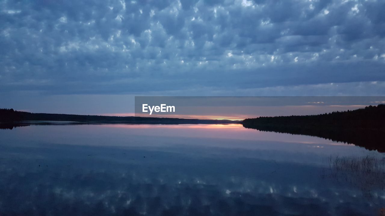 SCENIC VIEW OF SEA DURING SUNSET