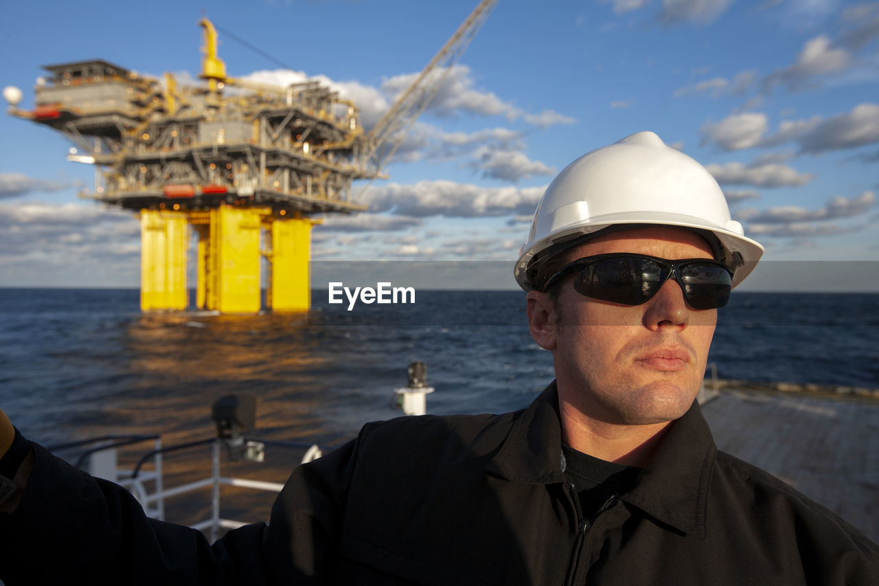 Offshore energy production with person on ship