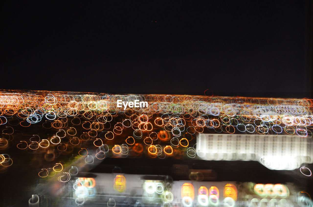 Defocused image of colorful lights at night