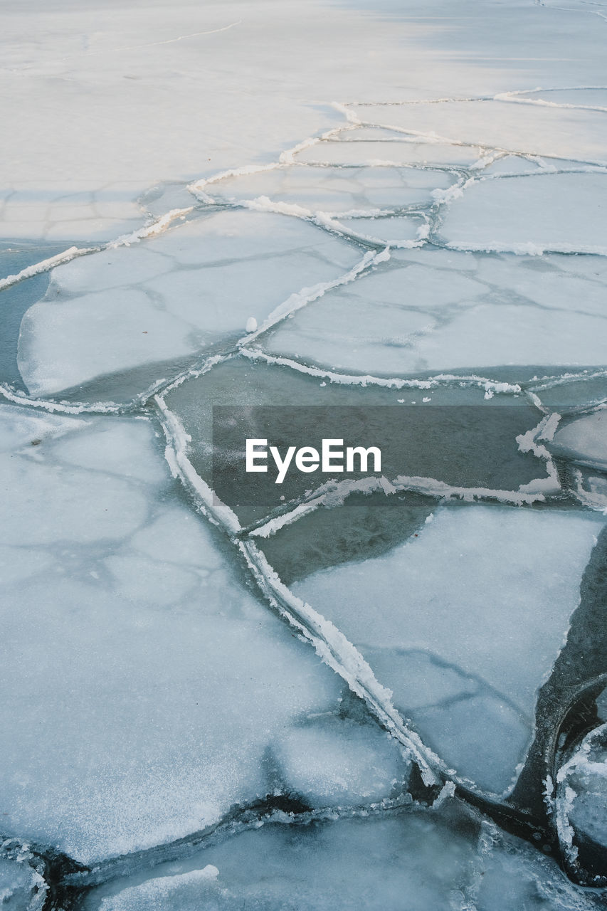 High angle view of frozen sea water