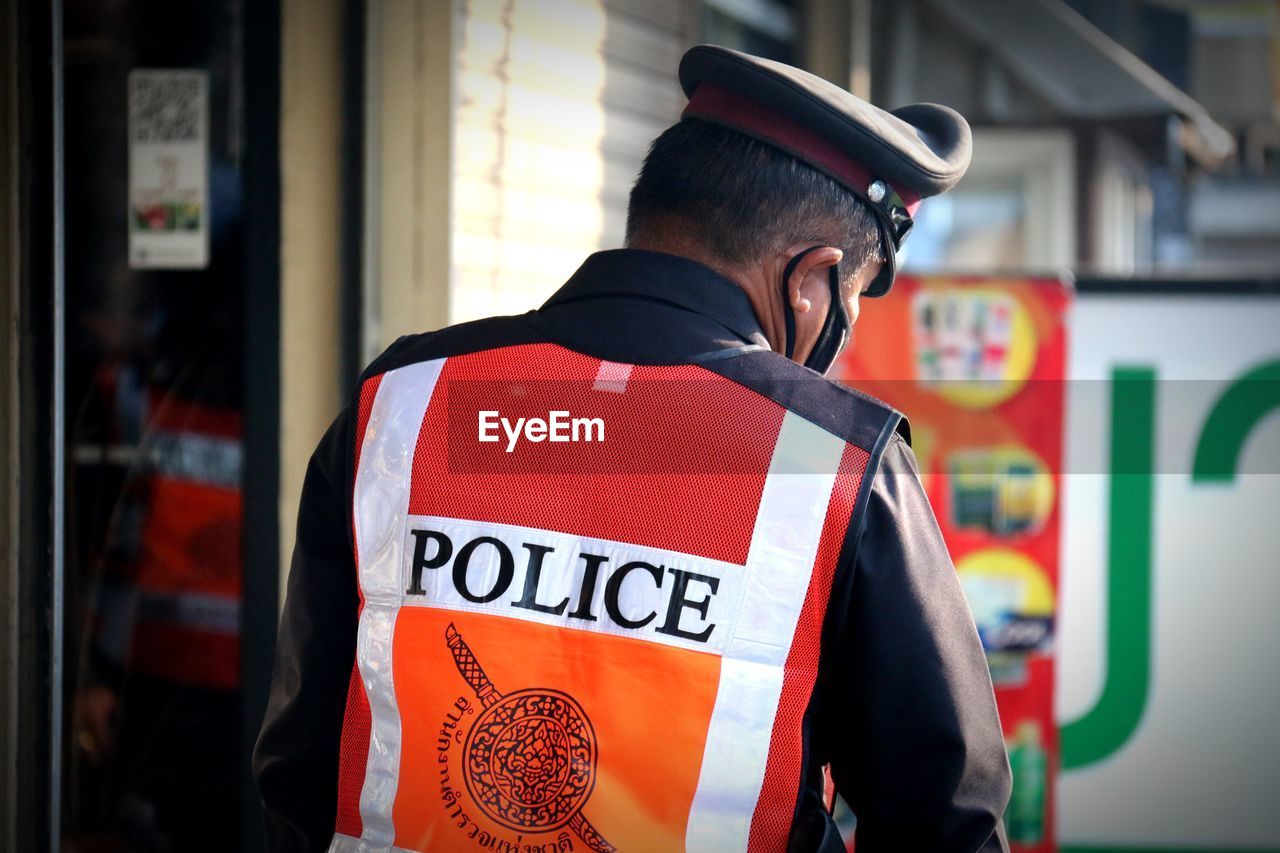 Rear view of policeman