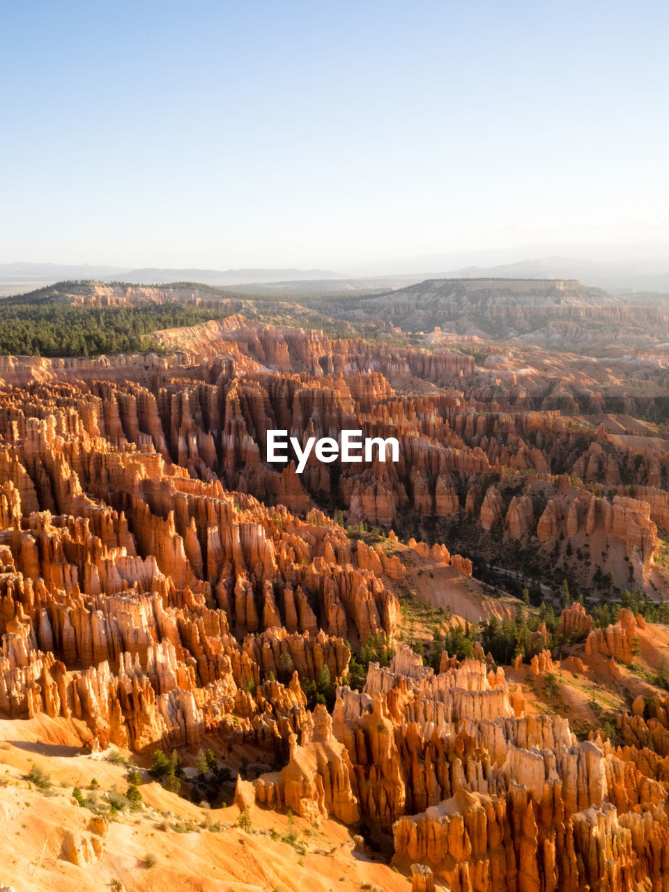 Scenic view of rocky mountains against clear sky