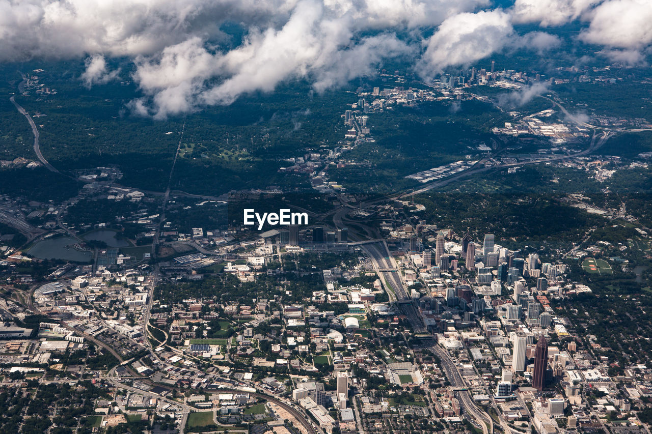 Aerial view of cityscape against sky