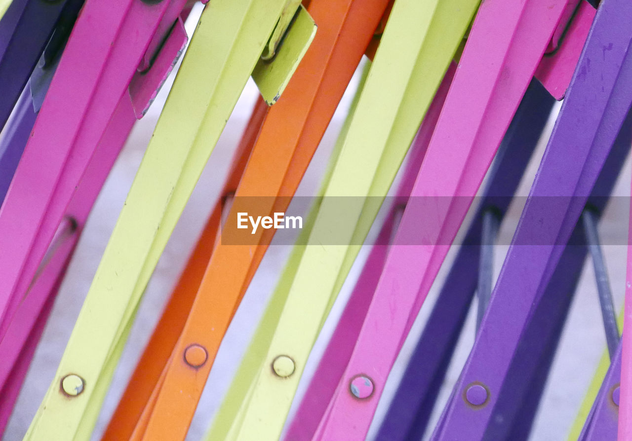 Full frame shot of colorful folded chairs