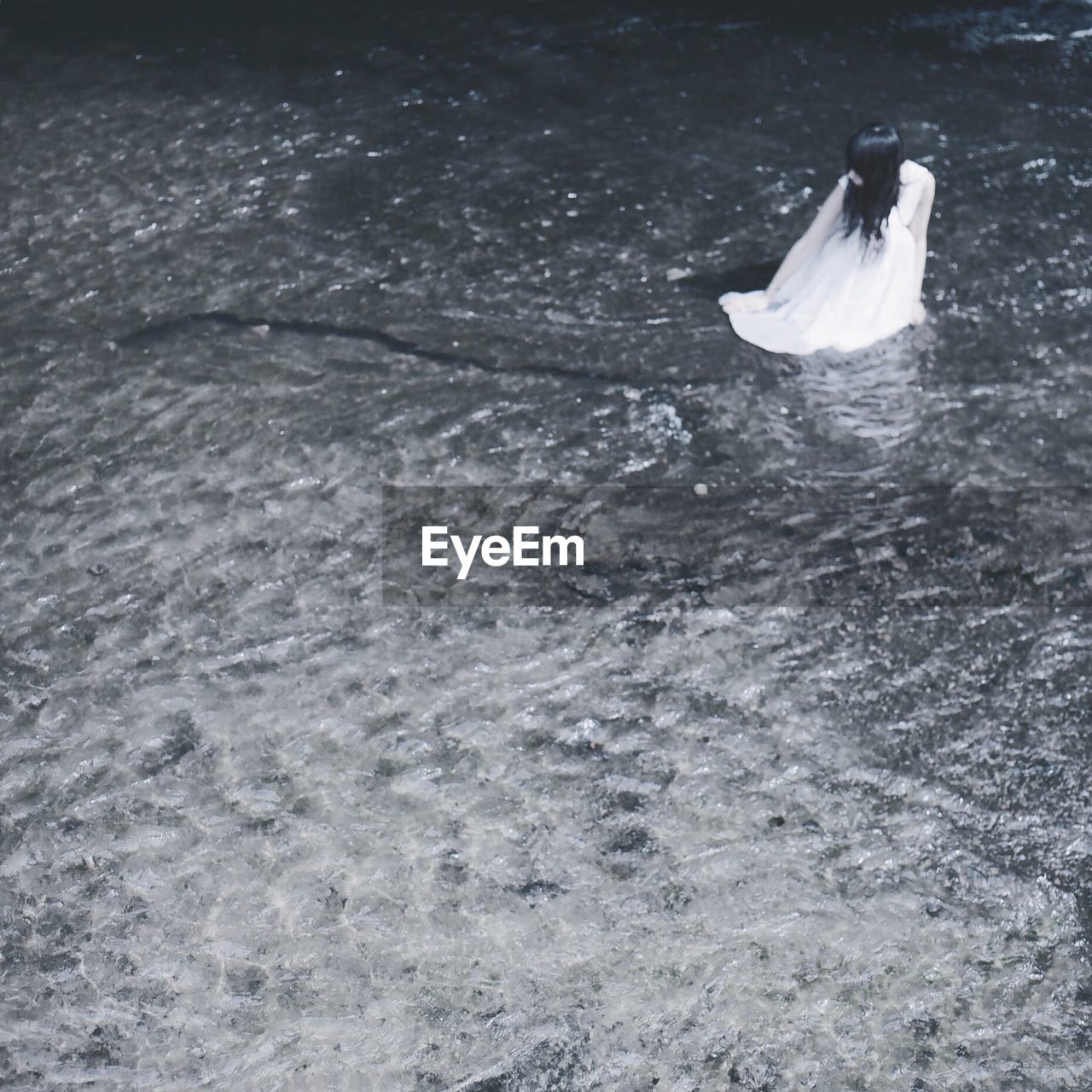 High angle view of woman in lake