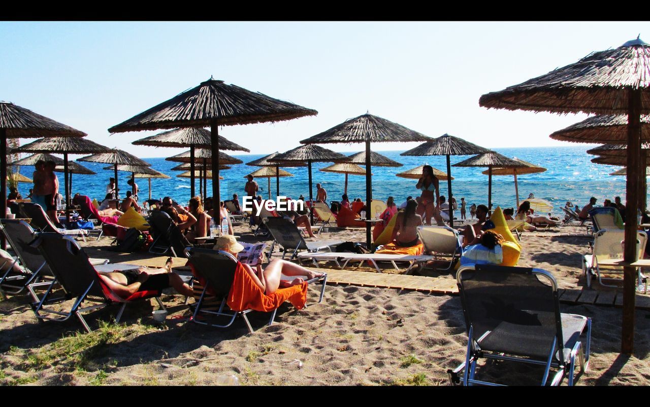 LOUNGE CHAIRS ON BEACH