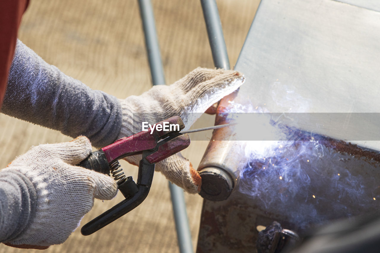 Welder working on a factory