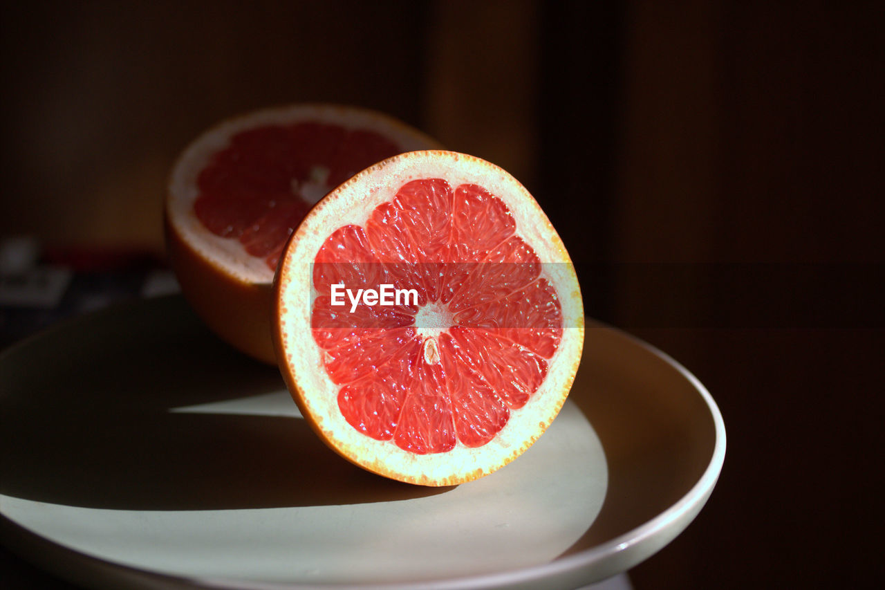 Close-up of citrus slices in plate