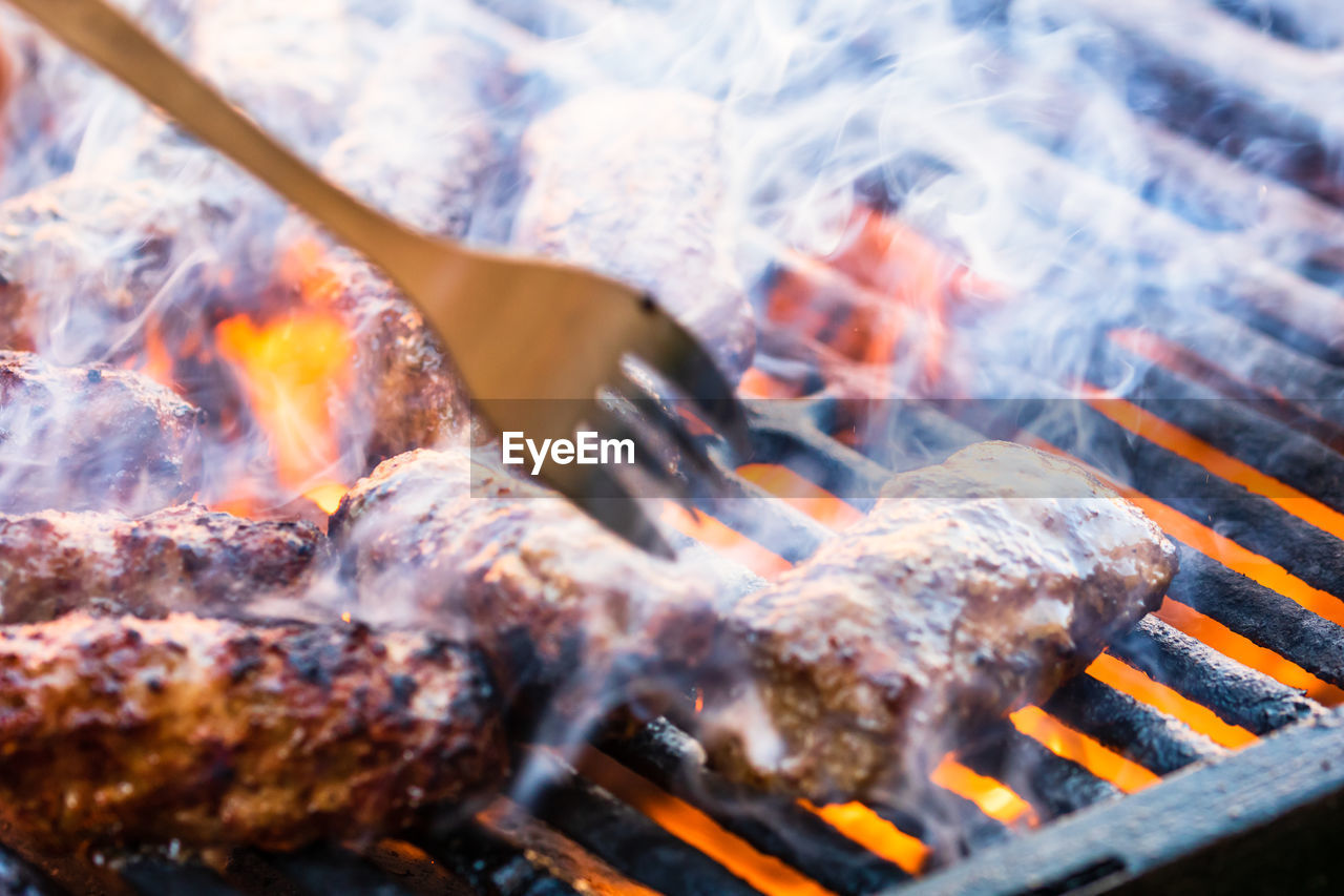 close-up of meat on barbecue