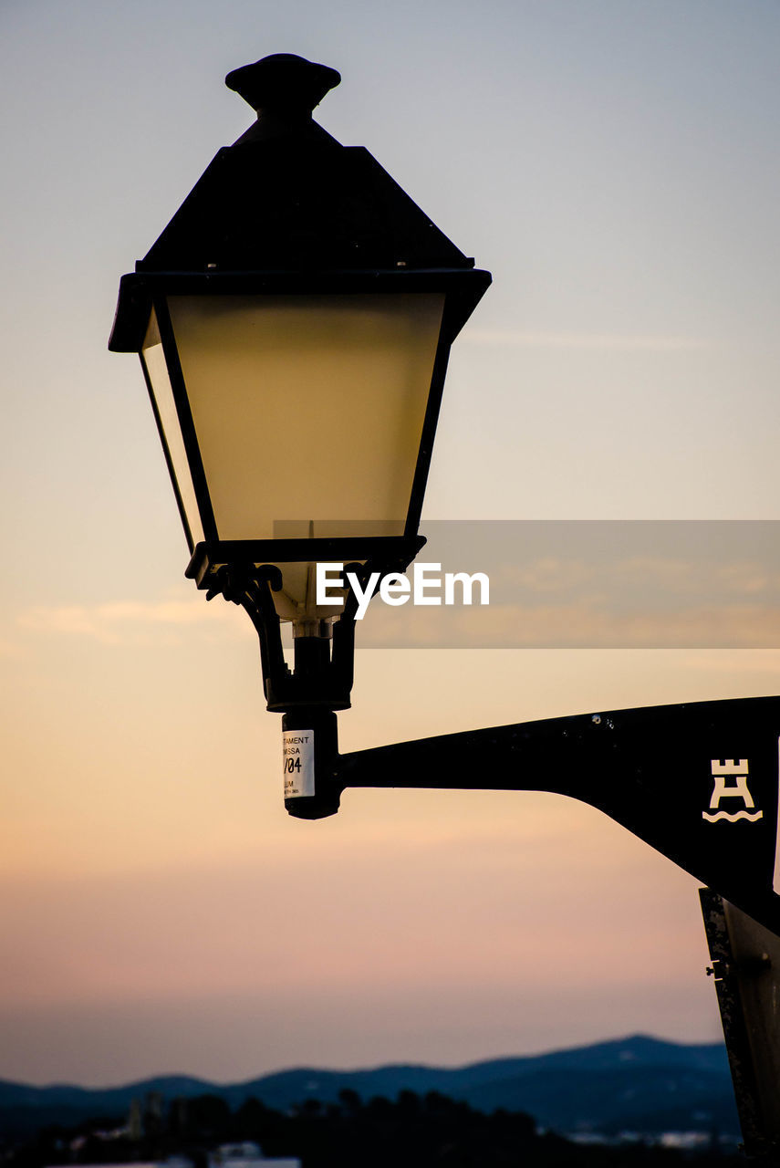 LAMP POST AGAINST SKY