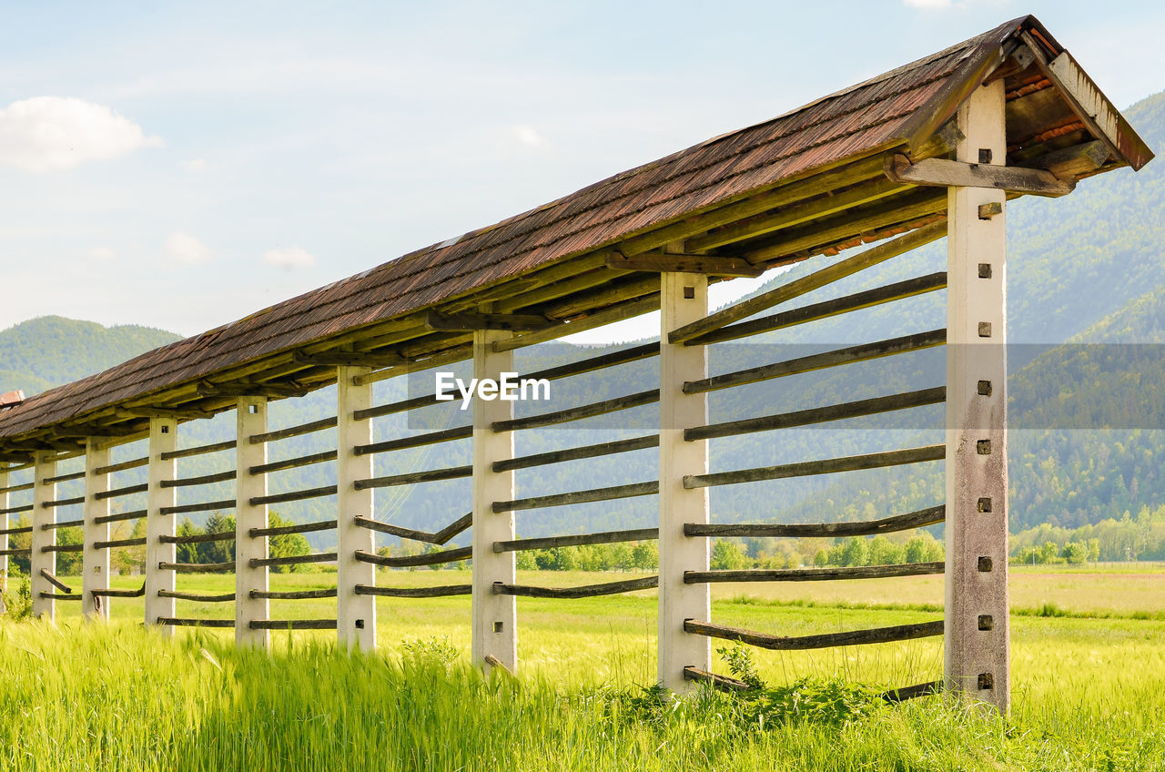 Gazebo in farm against sky