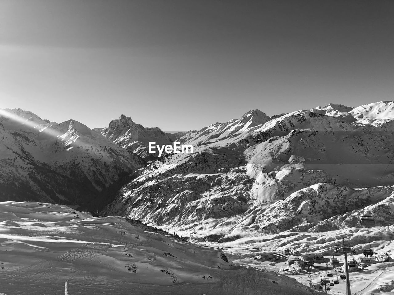 SCENIC VIEW OF SNOWCAPPED MOUNTAINS AGAINST SKY DURING WINTER