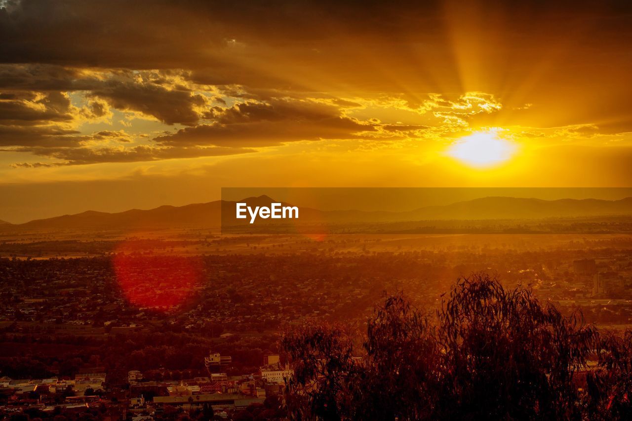 Scenic view of sunset over landscape