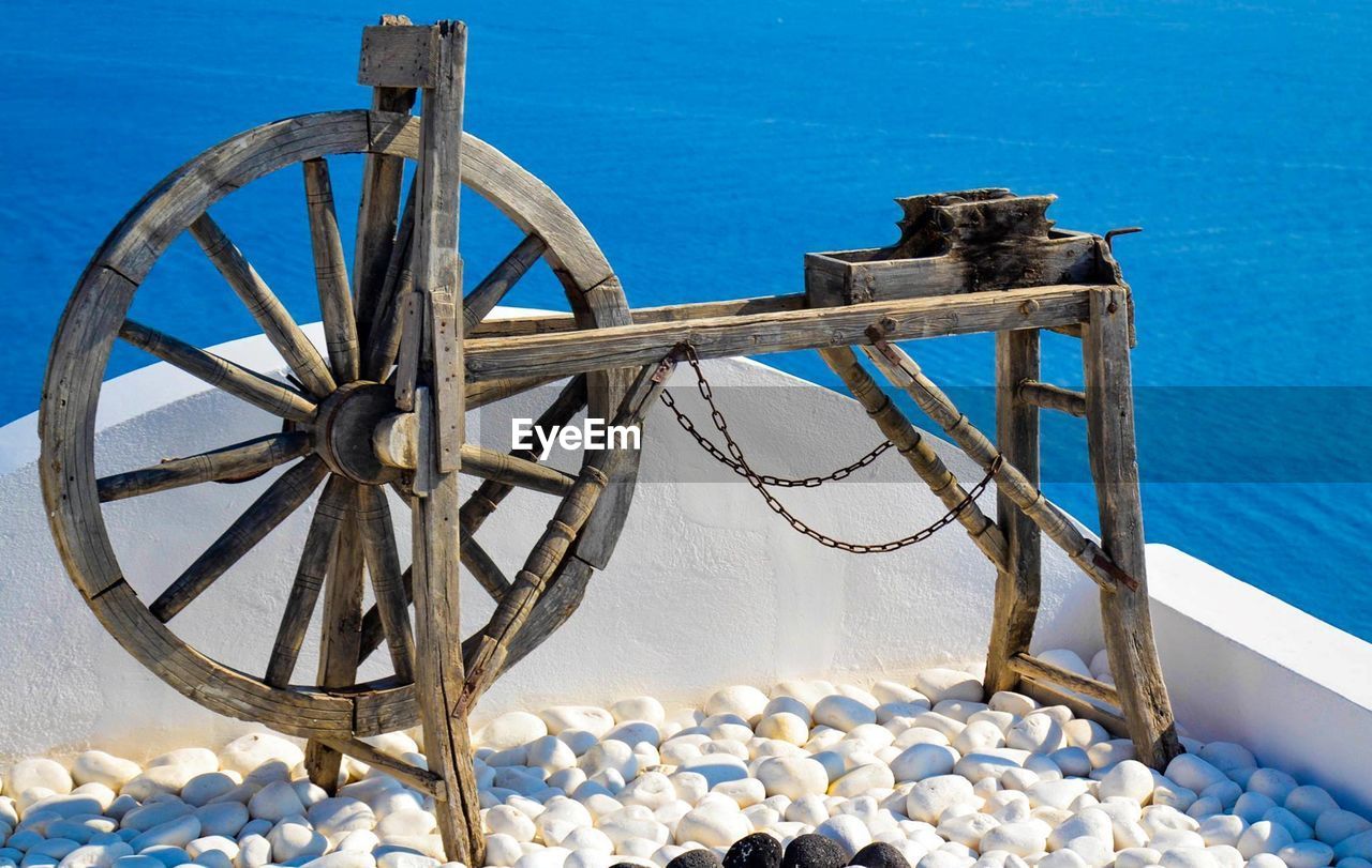 CLOSE-UP OF BOAT AGAINST BLUE SEA