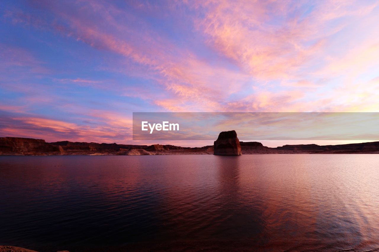 Scenic view of sea against sky during sunset