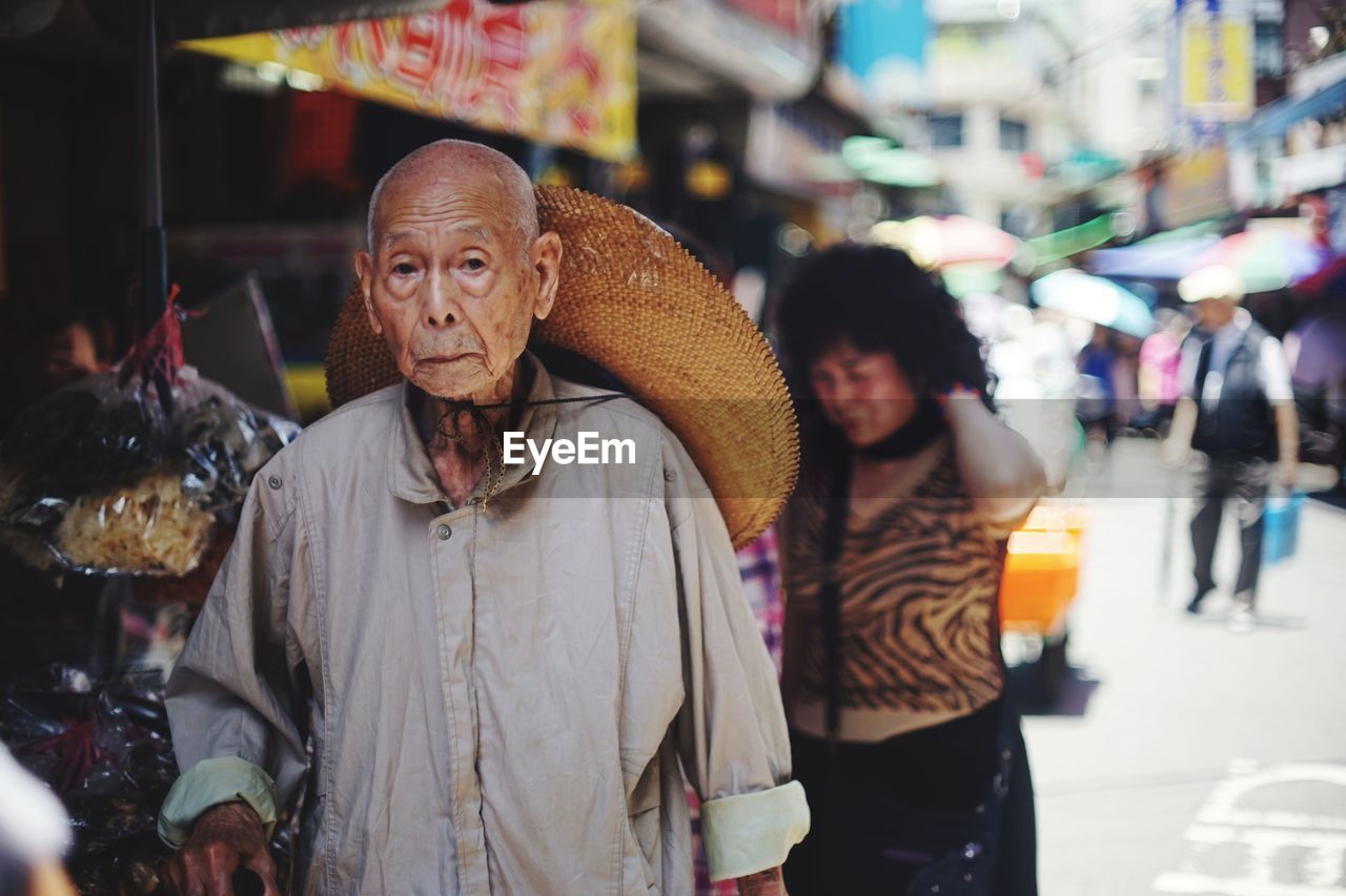 PEOPLE ON STREET IN CITY DURING WINTER