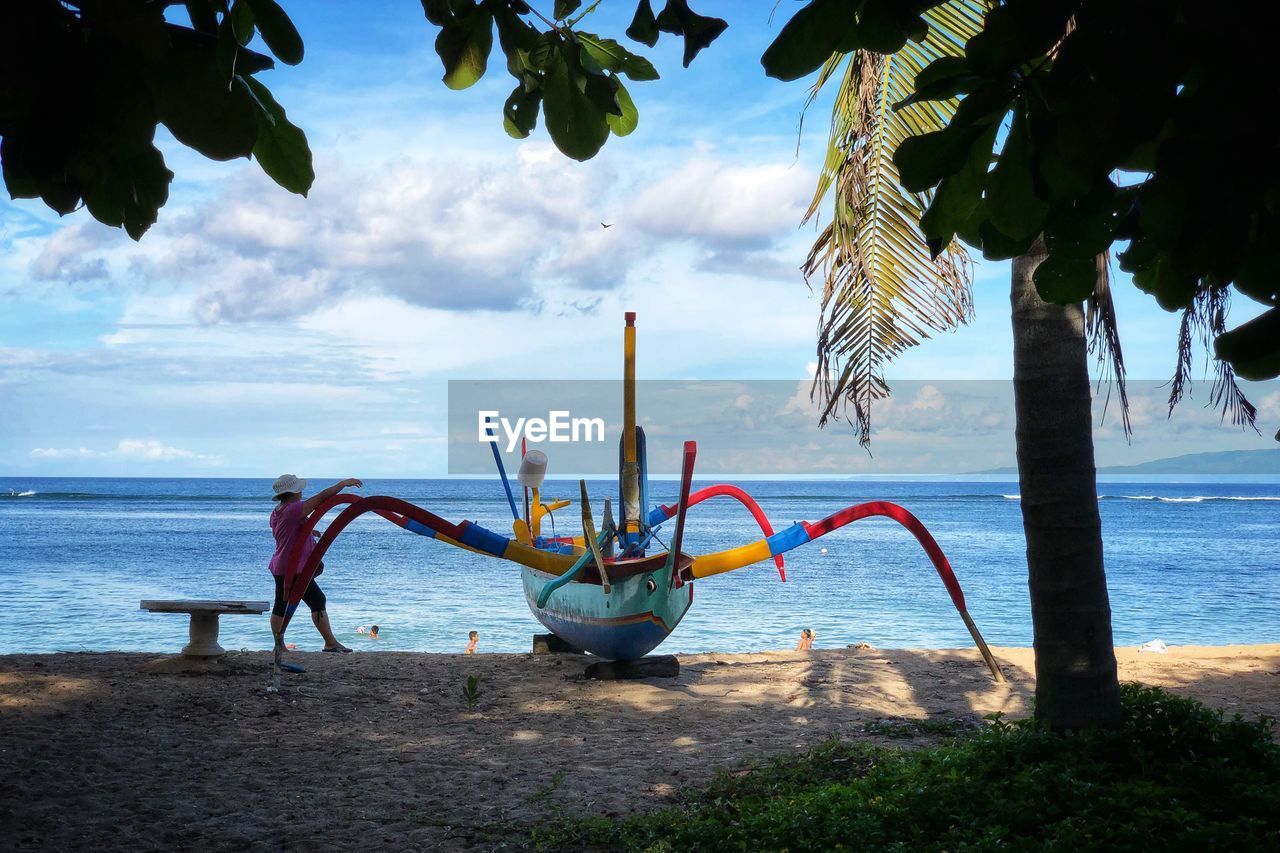 VIEW OF BEACH AGAINST SKY