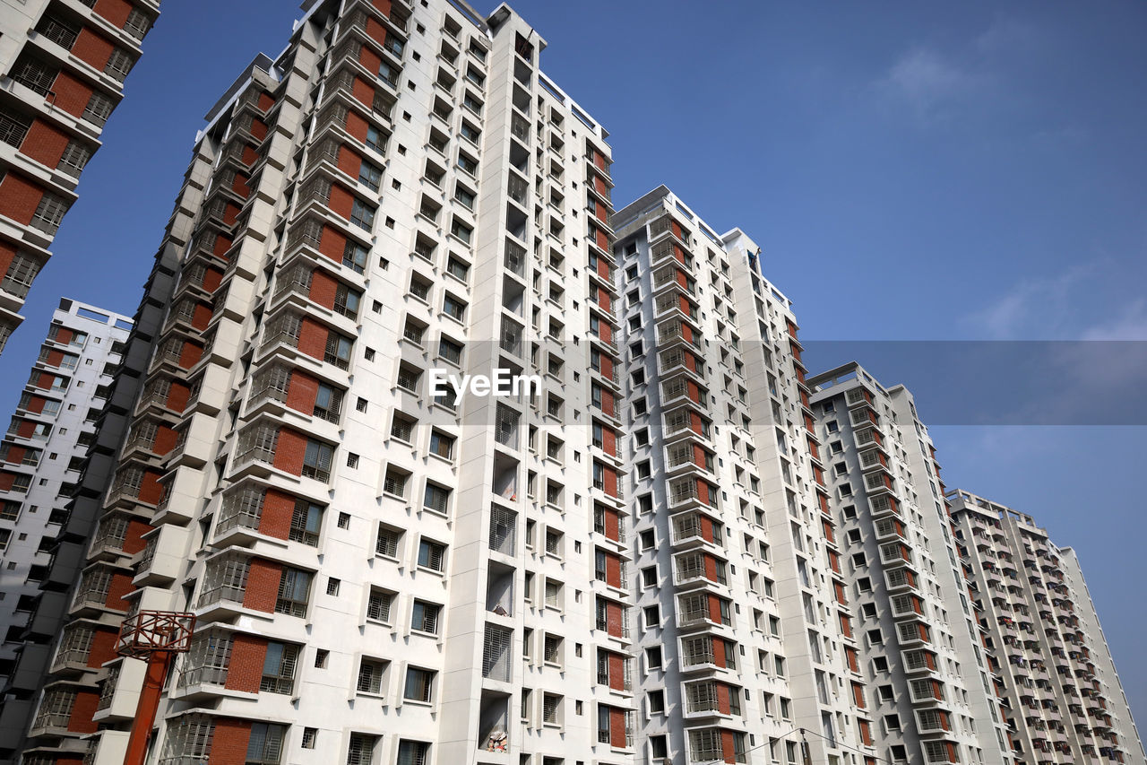 Low angle view of modern buildings against clear sky