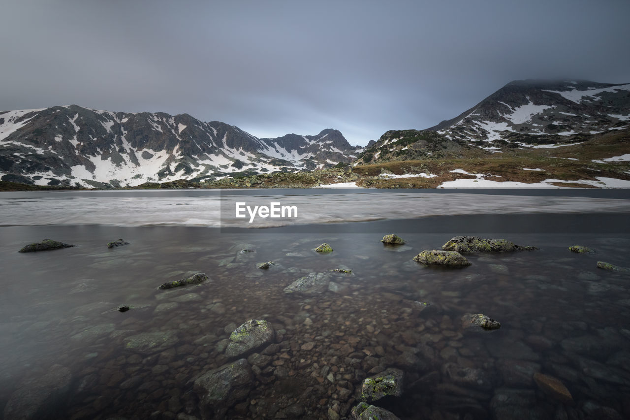 Long exposure in the morning at bucura lake, in retezat mountains 