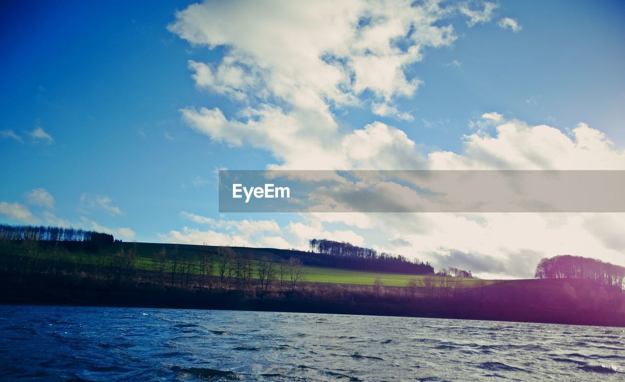 SCENIC VIEW OF RIVER AGAINST SKY