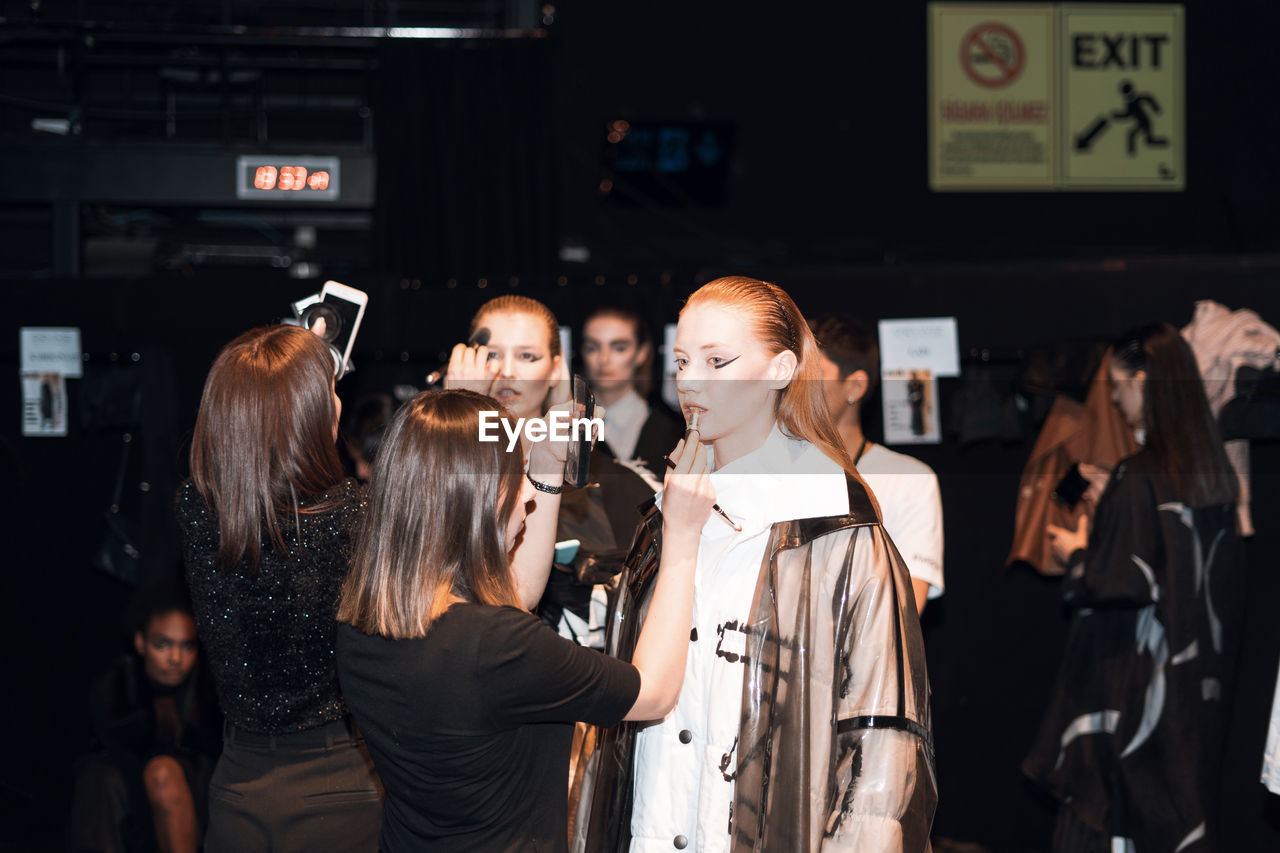 GROUP OF PEOPLE AT CONCERT